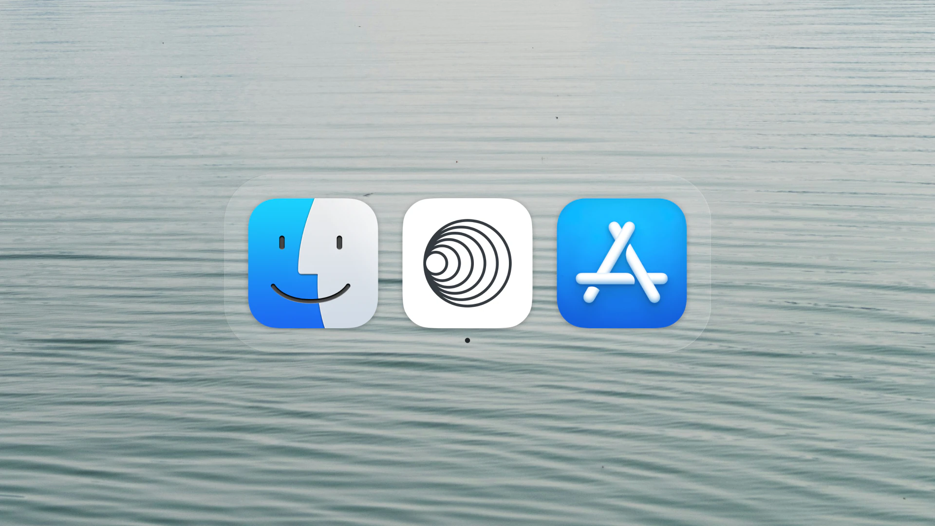 Rei's icon, nested circles, in the macOS Dock between Finder and the App Store